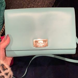 A mint green Kate spade shoulder purse